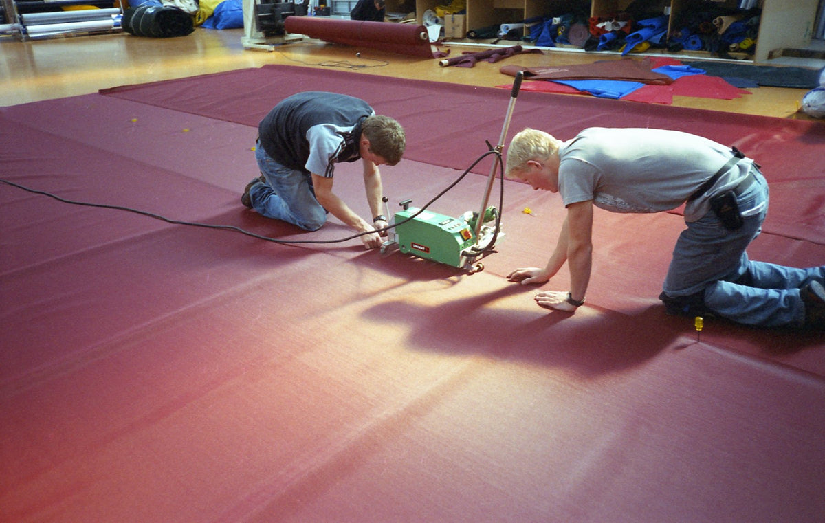 Shade Systems team experimenting with welded shade fabric construction.